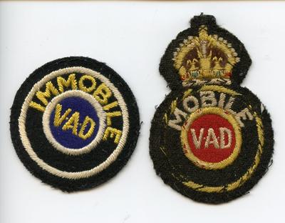 Two cloth badges: Mobile VAD and Immobile VAD