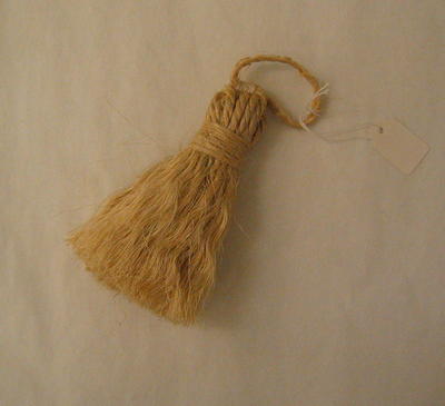 Tassle made from unravelled string