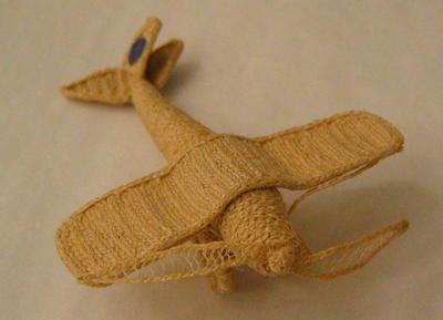 Miniature aeroplane made from string