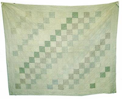 patchwork quilt made of red, blue and green gingham, backed by red striped flanelette.; Textiles/quilt; 1166/1