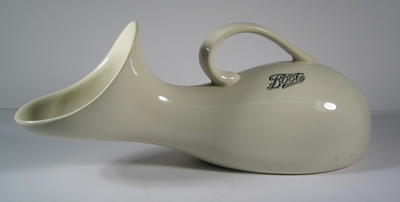 White china urinal with handle: 'Boots The Chemists'