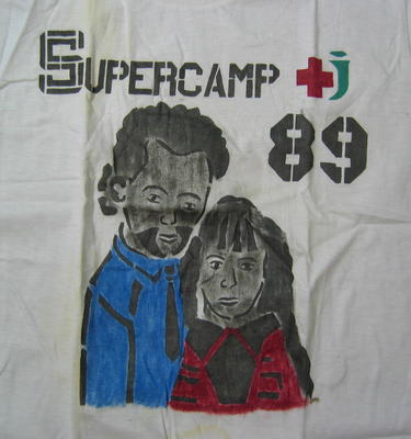 Small white t-shirt, with a girl and boy: Supercamp 89. Made by CYCO, 100% cotton, made in China.