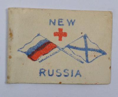 paper flag: 'New Russia. For the Russian Wounded and Disabled Soldier'