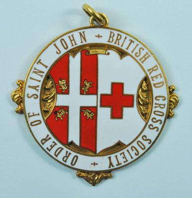 Circular medallion: Order of St John British Red Cross Society. Engraved on the reverse: For Services Rendered 5