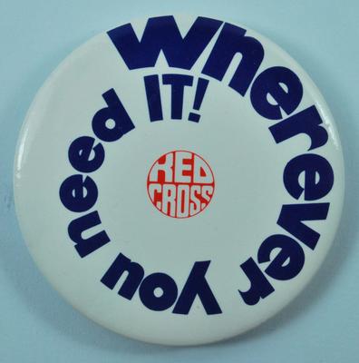 Circular plastic badge: 'Wherever you need it! Red Cross'