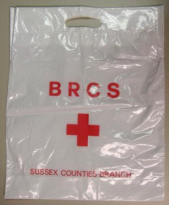 plastic bag printed 'BRCS Sussex Counties Branch'