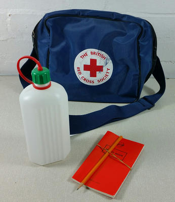 Navy blue washproof plastic first aid bag with contents