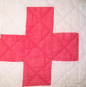 quilt with label "Gift of the Canadian Red Cross Society".; Textiles/quilt; 522/2