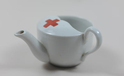 small china feeding cup with emblem