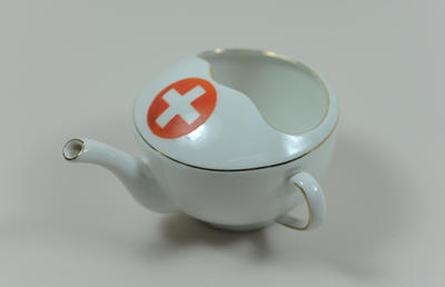 China feeding cup with gold rim and white Geneva cross on red circle