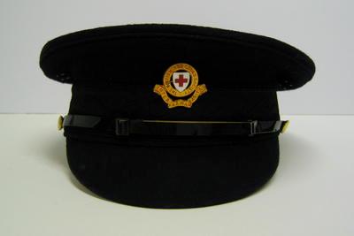 Men's peaked cap, with strap and gilt and enamel hat badge