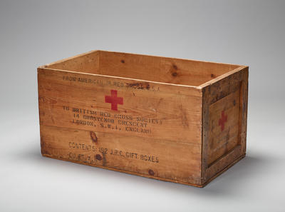 Large wooden crate 'from American Red Cross' originally containing Junior Red Cross 'gift boxes'