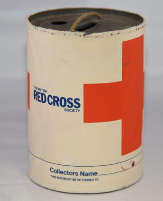 Metal cylindrical collecting box with the words 'The British Red Cross Society'