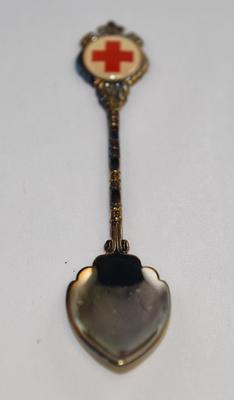 Souvenir spoon with Red Cross emblem at the top of the handle