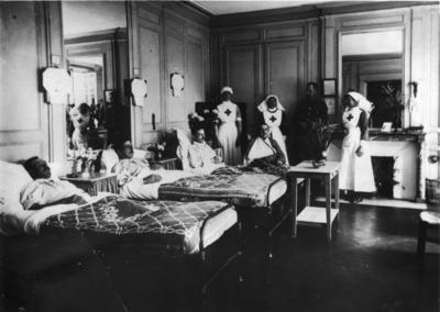 Four Red Cross staff and four patients at a VAD hospital in Gournay, France