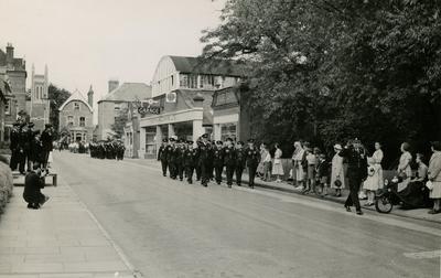 Group of Male VADs from the Farnham Division, Surrey, marching past a Church