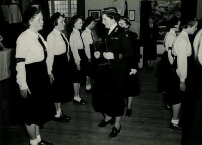 Group of Youth Members from the Farnham Division lined up for Inspection by Officers [in Church Hall after Parade]