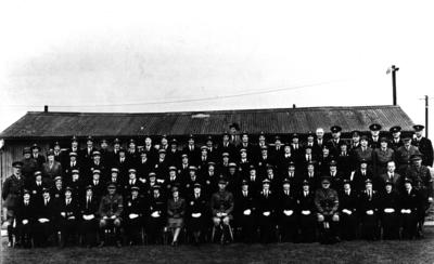 Personnel assembled for a group photograph at a training course at the anti-gas school in Winterbourne Gunner, Wiltshire