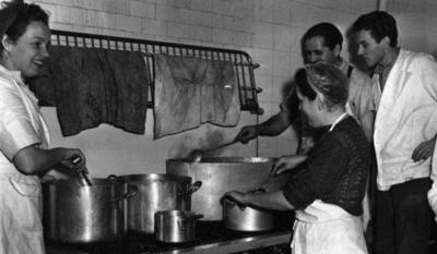 Hungarian refugees cooking at Maiden Erleigh hostel