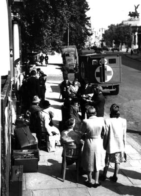 Black and white photograph. Air raid precaution and evacuation duties [training exercise] on Grosvenor Crescent, London