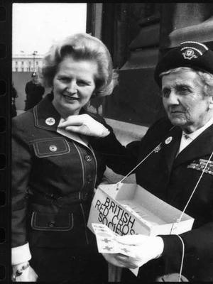 Margaret Thatcher buying a pin during Red Cross Week; 119(15)/IN3643