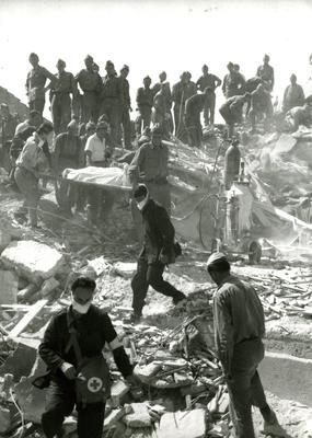 Photograph of Red Cross workers looking for survivors following Skopje earthquake