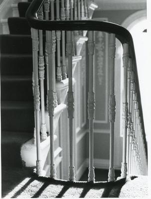 Black and white photograph of the staircase at Grosvenor Crescent