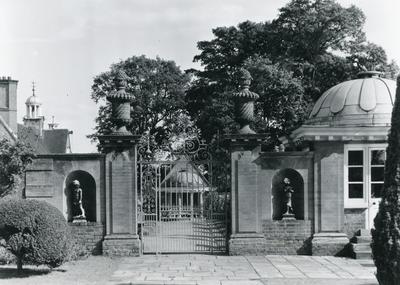 Black and white photograph of the gardens and exterior of Barnett Hill