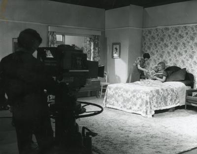 Black and white photograph of a scene from 'Home Nursing' for Tyne Tees Television