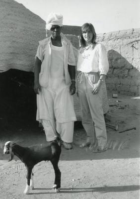 Black and white photograph of Ann Knight, Press Officer, with Sheik Moosa in the Red Sea Hills