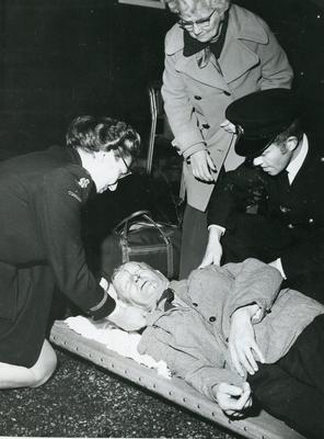 Black and white photograph of first aid at the road side - Surrey branch
