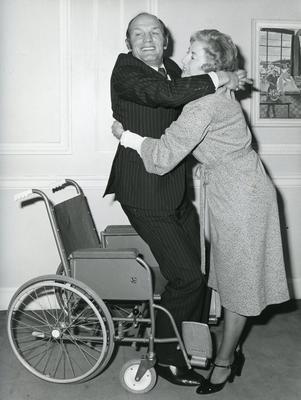 Black and white photograph of Dame Vera Lynn and Henry Cooper promoting Nursing for the Family