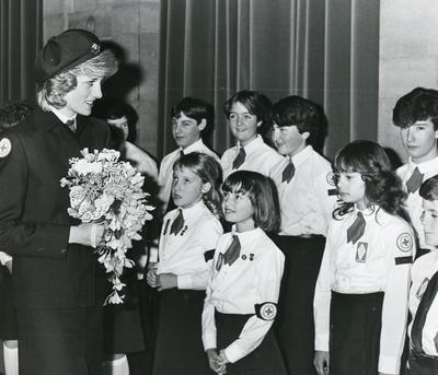 Black and white photograph of Princess Diana at a Carol Service at Bristol Cathedral wearing Red Cross uniform
