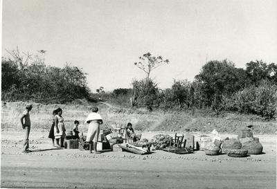 Black and white photograph of displaced people in El Salvador
