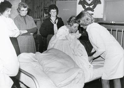 Black and white photograph of 'Nursing for the Family' 1981
