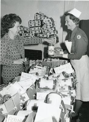 Black and white photograph of fundraising during Red Cross Week 1976
