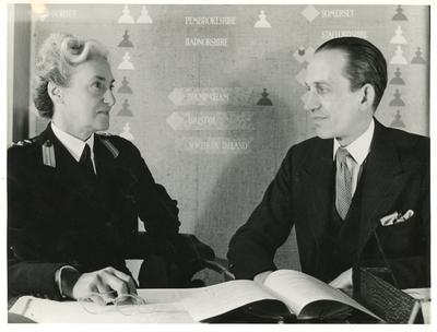 Black and white photograph of Mrs Harold Raymond, Vice-Chairman, and Mr Gilbert Barker, Librarian of the Hospital Library Department