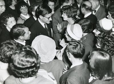 Black and white photograph of Yves Saint Laurent at the Christian Dior Show at Blenheim Palace 1954