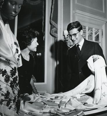 Black and white publicity photograph of Yves Saint Laurent in connection with the Christian Dior Show at Blenheim Palace 1954