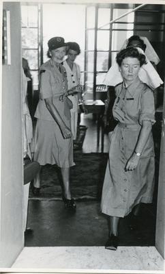 Black and white photograph of Lady Mountbatten on tour of a British Military Hospital in Tripoli