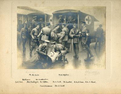 Black and white photograph of a painting of wounded soldiers and Red Cross ambulance drivers
