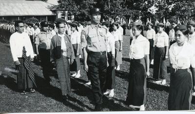 Black and white photograph of the Burmese Junior Red Cross during an inspection