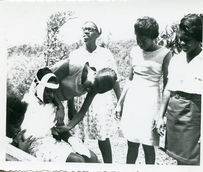 Black and white photograph of activities of the Grenada Junior Red Cross