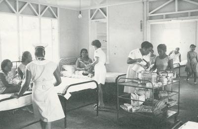 Black and white photograph of the Red Cross trolley at Colony Central Hospital Tanawa