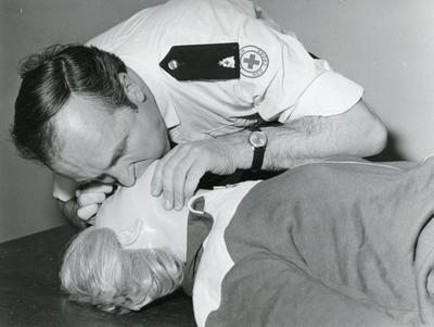 Black and white photograph of first aid training in resuscitation