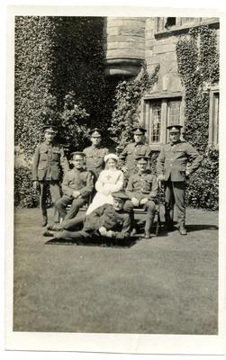 Patients and V.A.D posing on the grounds of Dalston Hall Auxilliary Hospital, Dalston, Cumberland