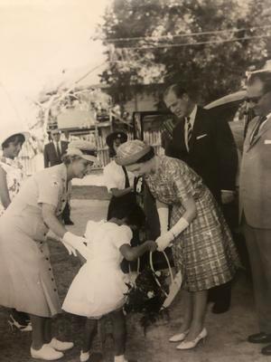 Her Majesty Queen Elizabeth II and Prince Phillip visit the Princess Elizabeth Convalescent Home for Children in British Guiana (now independent Guyana).