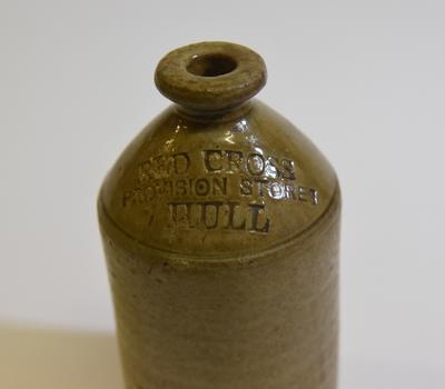 Stoneware bottle impressed with 'Red Cross Provision Stores Hull'