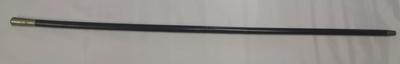 Black wooden walking cane with metal ferrule engraved with Red Cross emblem