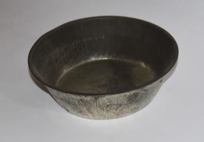 Large tin bowl
